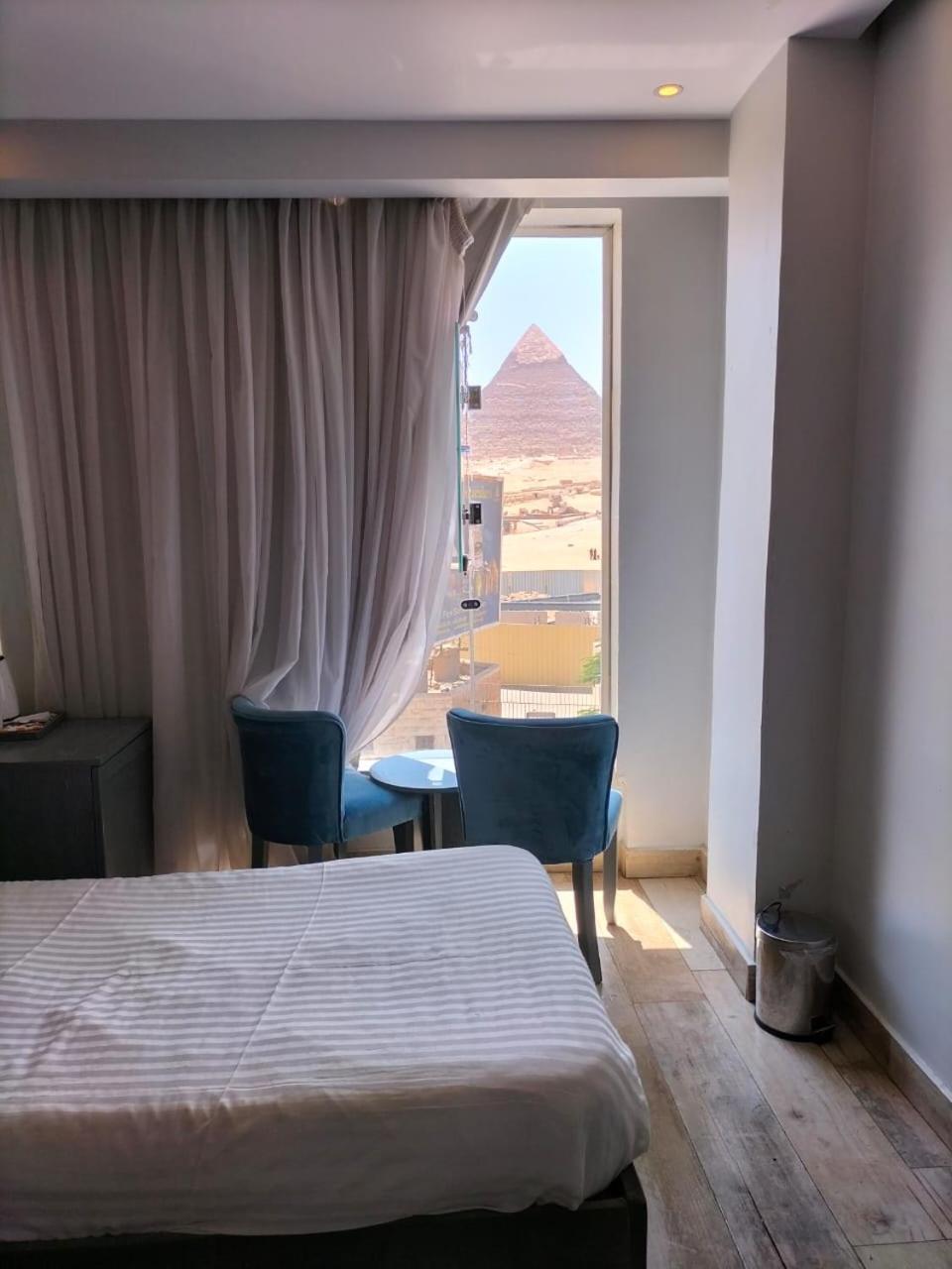 Pyramids Show Hotel Kafret el-Gabal Exterior photo